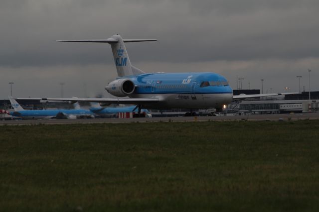 de Havilland Dash 8-400 (PH-KZF) - Fokker 70, KLM Cityhopper, taxiing to the runway Polderbaan at Schiphol Amsterdam Airport (Holland).