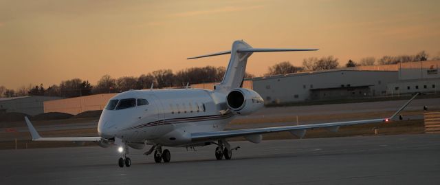 Bombardier Challenger 300 (N772QS) - 12/12/21 TAXING TO SIGNATURE FLIGHT SERVICES FROM RUNWAY 23 4:35PM