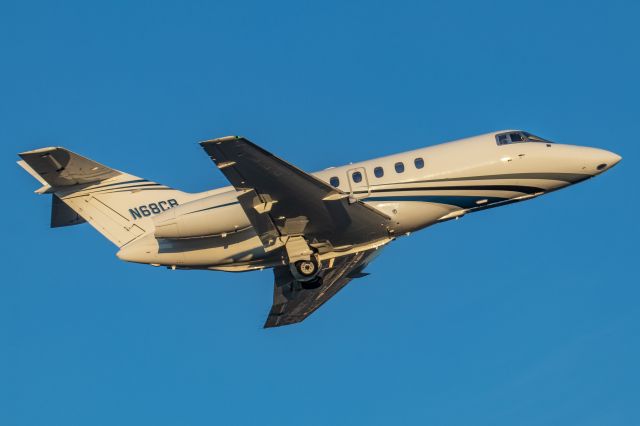 Hawker 800 (N68CB) - March 19, 2019, Lebanon, TN -- This Hawker 800XP, owned by Cracker Barrel Restaurants, is departing off runway 01 into the morning sun. Cracker Barrel was founded in Lebanon, Tennessee is the home of their corporate headquarters. Uploaded in low-resolution. Full resolution is available at cowman615 at Gmail dot com. cowman615@gmail.com