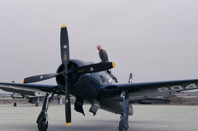 Cessna 152 (N58204) - KOAR - F8F-1 Bearcat at the Marina Airport Open House May 2003.  Grumman F8F-1 Bearcat, N58204 was delivered to the U. S. Navy as BuNo 95255