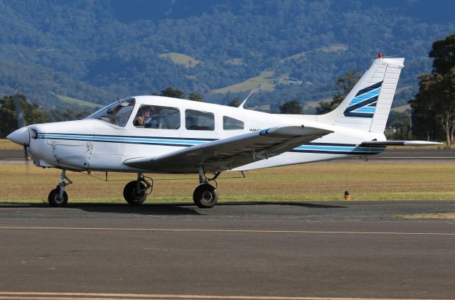 Piper Cherokee (VH-VJA) - VJA Taxiing past the HARS hangar. Taken with a 70-200mm