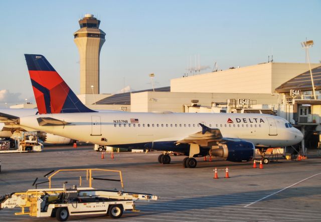 Airbus A319 (N357NB) - Sitting at the gate during golden hour.  9/6/2021.