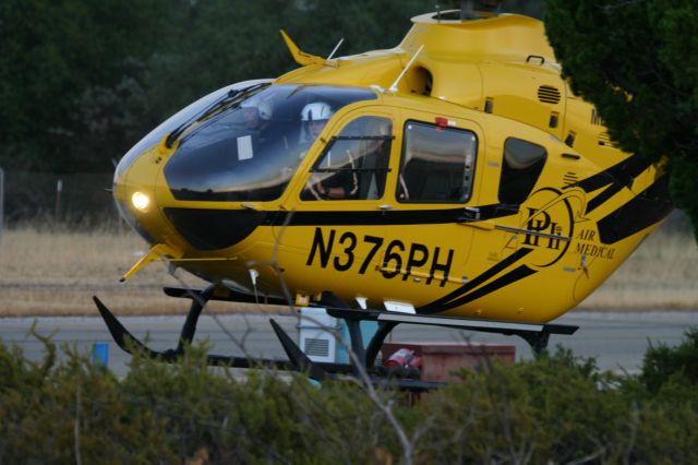 Eurocopter EC-635 (N376PH) - KRDD - Who is that guy on the ladder with the camera,,????????