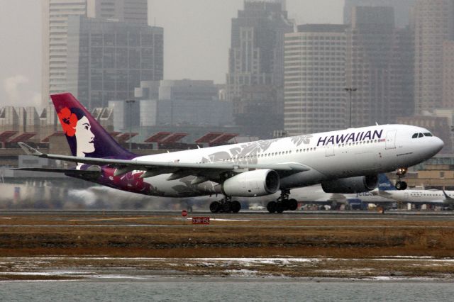 Airbus A330-200 (N396HA) - Hawaiian departing a cold snowy Boston Logan Airport for warmer destination Honolulu on 1/22/22. 