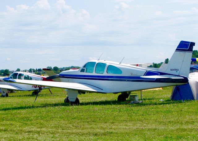 Beechcraft Bonanza (33) (N5494U) - At Oshkosh. 1967 Beech 35-C33 Debonair