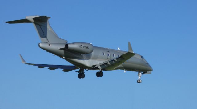 Bombardier Challenger 300 (N711NK) - On final is this 2010 Bombardier Challenger BD-100-1A10 in the Spring of 2019.