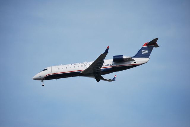 Canadair Regional Jet CRJ-200 (N223JS) - Approaching runway 23 - 3/11/09
