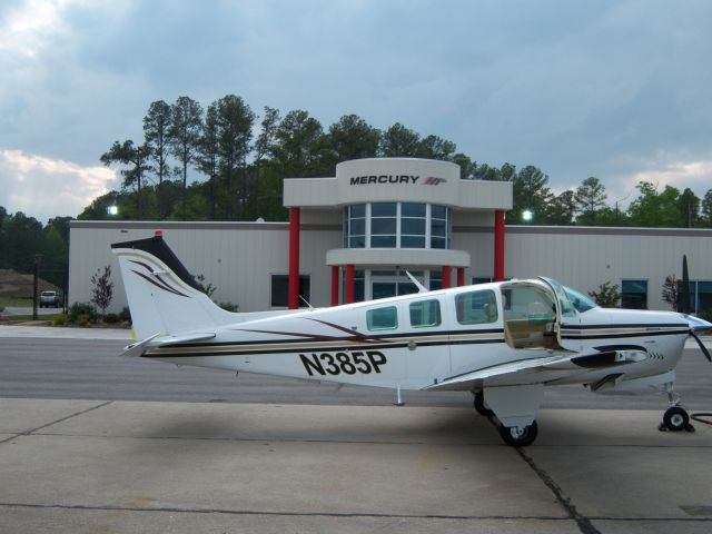 Beechcraft Bonanza (36) (N385P) - Parked in front of Mercury at New Port News VA