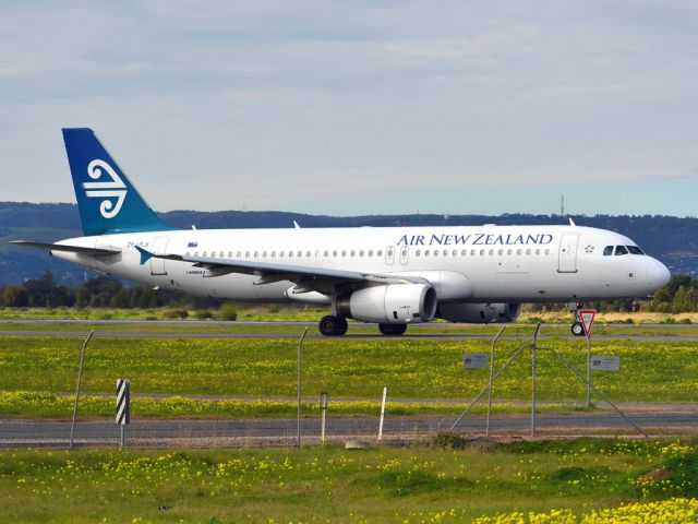 Airbus A320 (ZK-OJI) - On taxi-way heading for take off on runway 05, for flight home to Auckland, New Zealand. Thursday 12th July 2012.