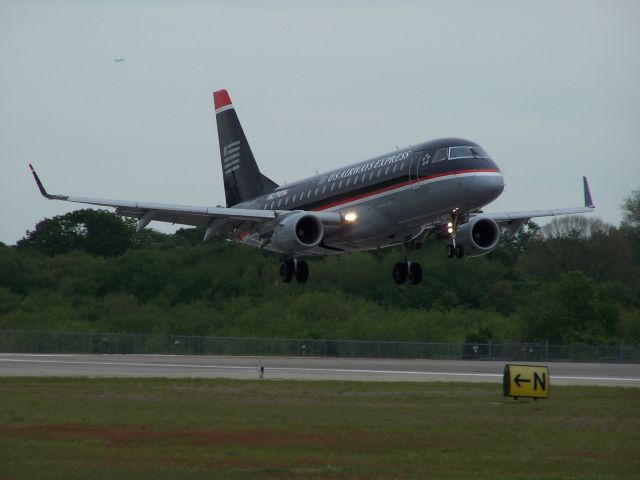 Embraer 170/175 (N827MD) - N827MD about to flare on landing at Providence TF Green
