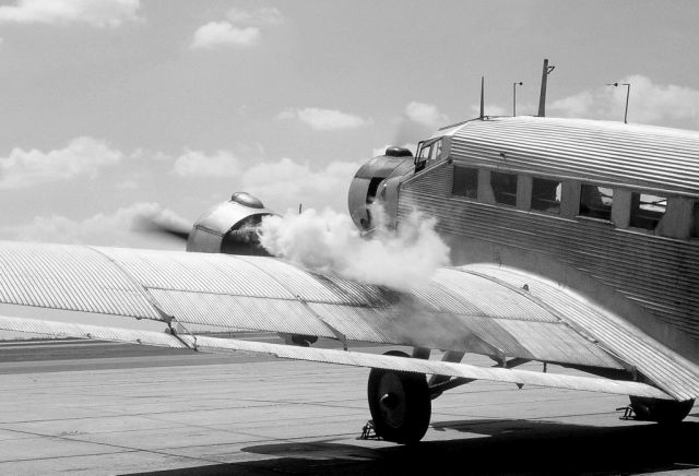 N99059 — - CAF JU-52 seen starting No. 1 engine on the ramp.