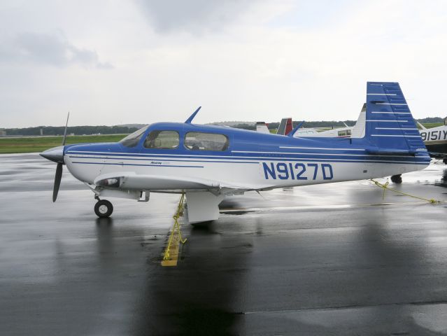 Mooney M-20 (N9127D) - Gathering for the Mooney arrival at Oshkosh. 18 August 2015.