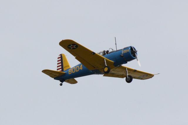 Cessna Skyhawk (N75004) - Vultee BT-15 Valiant (N75004) departs Sarasota-Bradenton International Airport