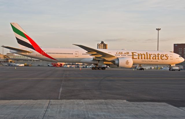 BOEING 777-300ER (A6-ECP) - 2nd daily non stop flight to Dubai waiting to tow over to the gate in terminal C