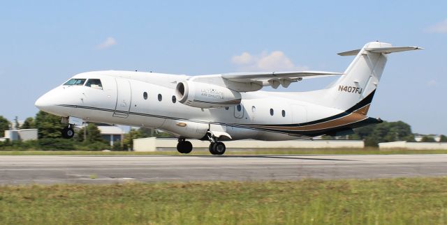 Fairchild Dornier 328JET (N407FJ) - An Ultimate Jet Charter Fairchild Dornier 328-300 (328JET) departing Pryor Regional Airport, Decatur, AL, via Runway 18 - September 13, 2019.