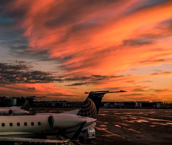 — — - Sunset Over IAH