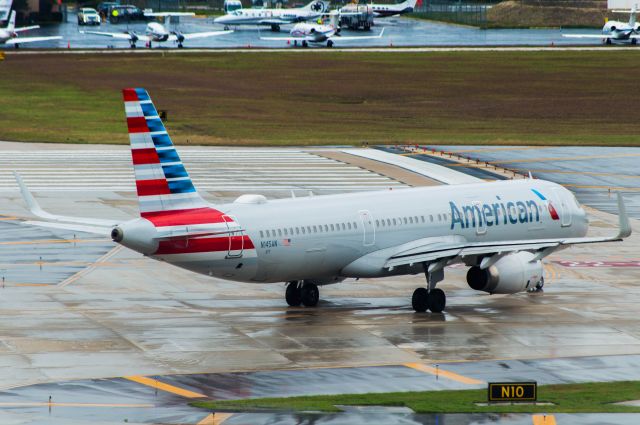 Airbus A321 (N145AN) - Holding Short Runway 4