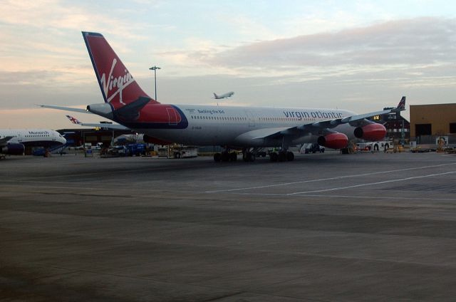 Airbus A340-300 (G-VSUN) - Virgin Atlantic International - A340-313 (G-VSUN). According to photo data the image was taken at 07.37 hrs 07 Feb 2005. From my research this photo taken during taxiing to stand (North Terminal) just after arrival at LGW from NCL on board British Airways flight BA8070 B737-436 (G-GBTA).