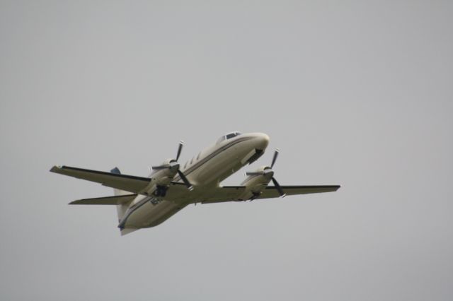 Fairchild Dornier SA-227DC Metro (N54GP) - Folding the gear in after a takeoff from KDTN.