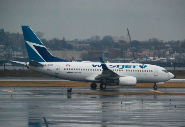 Boeing 737-700 (C-GWBF) - Westjet 737 at LGA.