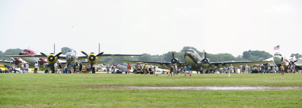 Douglas DC-3 — - DC-3s and a B-25 at Airventure 2010
