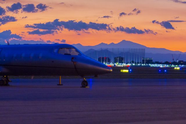 — — - A beautiful orange sunset over the airport due to smoke in the air from wild fires.