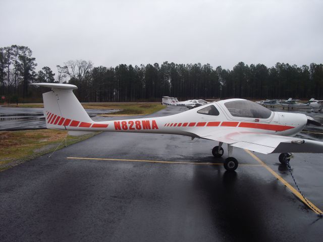 Diamond DA-20 (N828MA) - Tied down on Falcons ramp.