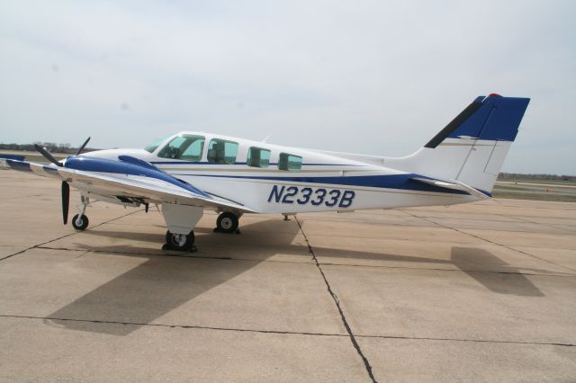 Beechcraft Baron (58) (N2333B) - AT WILEY POST AIRPORT