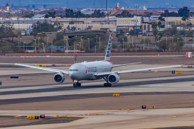 Boeing 777-200 (N756AM) - An American Airlines 777-200 taking off from PHX on 2/14/23. Taken with a Canon R7 and Canon EF 100-400 II L lens.