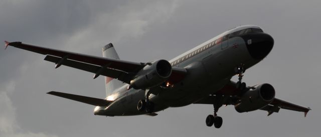 Airbus A319 (G-EUPJ) - A British Airways A319 wearing the 'BEA livery' on final approach into LHR, landing on runway 09L.br /br /Location: Stanwell Moor Road, beside runway 09L.br /Date: 28.08.22 (dd/mm/yy)