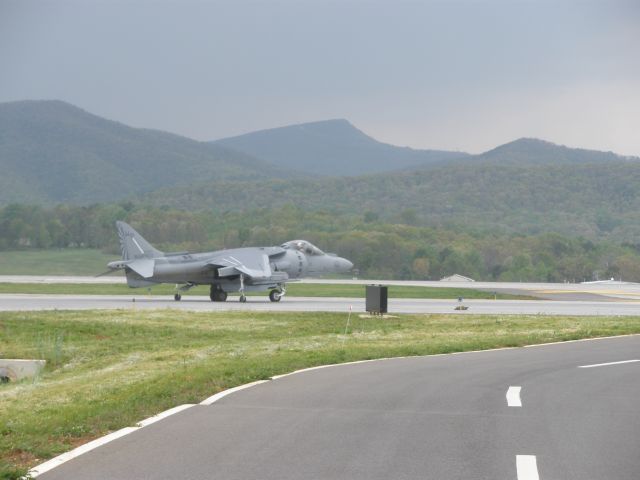 — — - Taxi for departure to runway 24 in Roanoke,Va.The sharp mountain peak in back ground is Mc-Afees Knob.