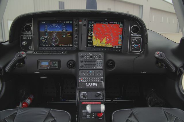 — — - Brand new 2015 Cirrus SR22T Cockpit with Garmin Perspective.