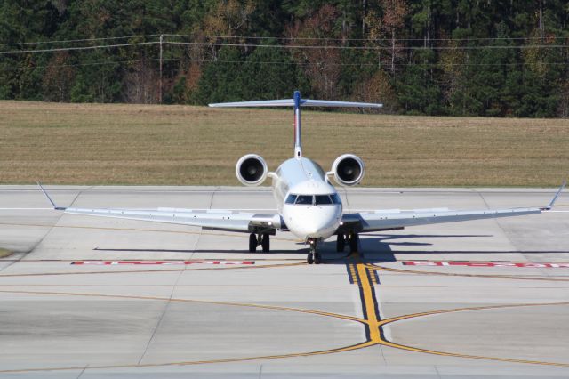 Canadair Regional Jet CRJ-900 (N182GJ) - N182GJ vacates runway 5L