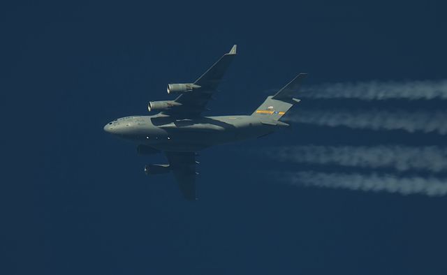 Boeing Globemaster III (95-0107) - 27/12/2015 USAF C-17 Globemaster III tail number 95-0107 passes overhead Lancashire,England,UK at 34,000ft working callsign "Reach 150".br /This machine looks truly amazing as she powers her way through the winter sunshine.br /Pentax K-5