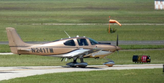 Cirrus SR-22 (N241TM) - Taxiing to departure is this 2016 Cirrus SR-22 in the Summer of 2021.