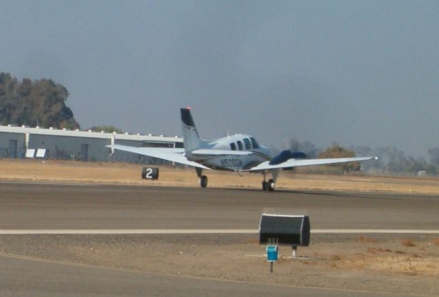 Beechcraft Baron (58) (N5080N) - Tanked and Departing for Hawaii