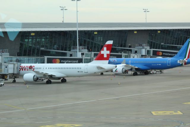 OSKBES-MAI Kityonok (HB-JCA) - Two A220 next to each other in Brussels airport Zaventem