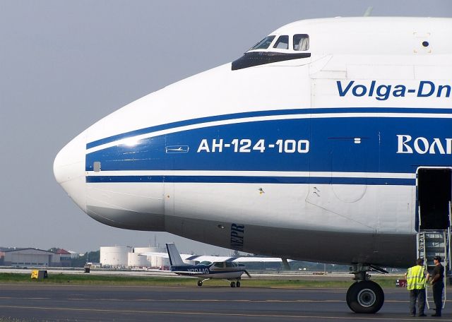 Antonov An-124 Ruslan (RA-82042) - As the nose of the AN-124 dwarfs the Cessna!!