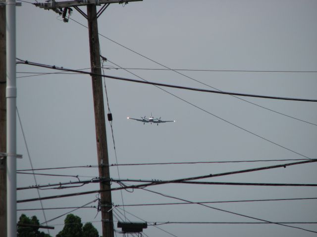 Cessna Conquest 2 (N337KC) - Landing At York Airport runway 17, ehh... enough power lines?