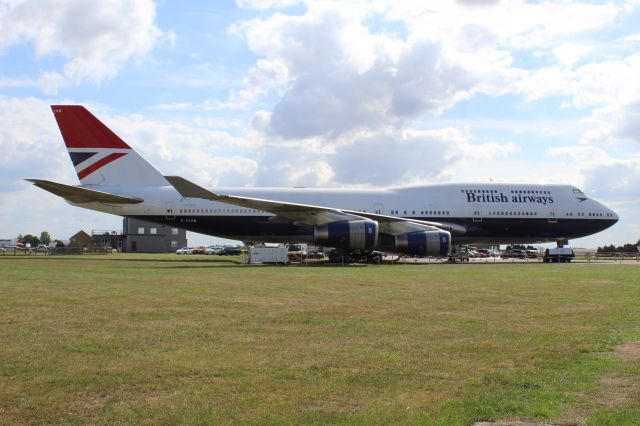 Boeing 747-400 (G-CIVB) - G-CIVB, A perserved BA B747-400 parked at Cotswold Kemble airport. It is wearing the first BA livery after BOAC and BEA merged in 1974, the livery being the 'Negus' livery. It was worn until 1978 when the Landor Livery was introduced.br /br /You are able to see the aircraft, and tour the plane at Cotswolt Kemble Airport, located in the county, Gloucestershire, England. Touring is avaliable once every 2 weeks, on a Wednesday.br /br /Location: Cotswold Kemble Airport.br /Date: 31.08.22 (dd/mm/yy).