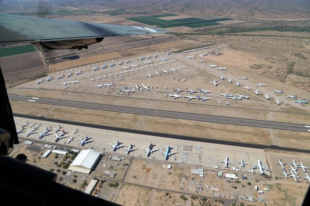 Consolidated B-24 Liberator (N224J) - Collings Foundation "Wings of Freedom Tour," 9 Apr 16, at Marana Regional Airport, AZ.  B-24J, Witchcraft, NX224J.  Looking down at Pinal Airpark, Marana AZ, KMZJ.