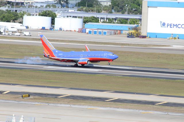 Boeing 737-700 (N228WN) - A Southwest B737-700 touches down at KTPA.