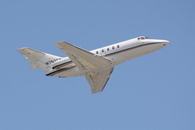 Hawker 800 (N752CS) - N752CS departs Runway 14 at Sarasota-Bradenton International Airport