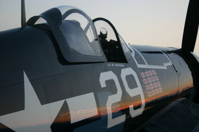 N29VF — - Fuselage shot of a Goodyear FG-1D showing off the reflection of a great sunset as another day draws to a close at EAA.