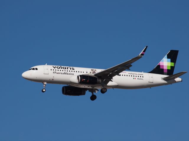 Airbus A320 (N525VL) - Volaris N525VL, an Airbus A320-233, landing at KLAS, McCarran International Airport.