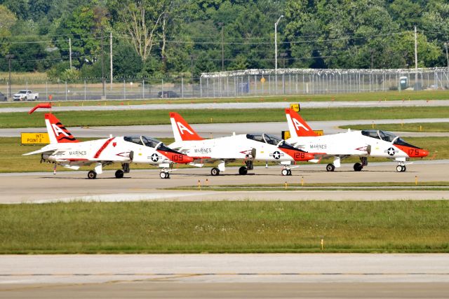 — — - Marine jets for race fly-over ceremony.