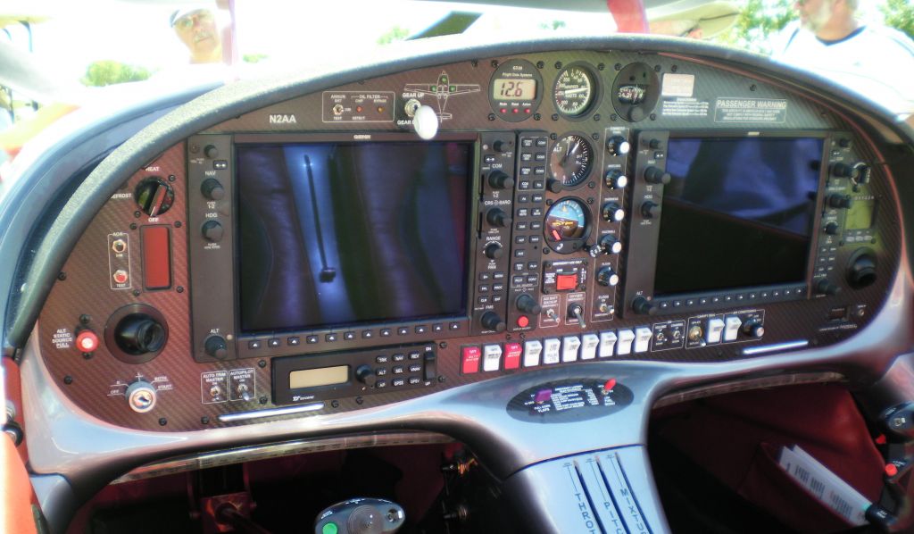 Lancair Legacy 2000 (N2AA) - Garmin 1000 glass in the cockpit of Lancair Legacy N2AA.  Notice the standby instruments in a vertical stack between the screens.