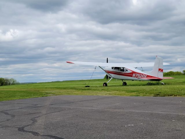 Cessna Skywagon 180 (N7926V) - Sitting in the tiedowns waiting for the weather to break. 