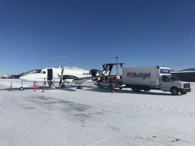 Beechcraft 1900 (N474LC) - N474LC wearing Alpine Air’s new livery unloading in JAC