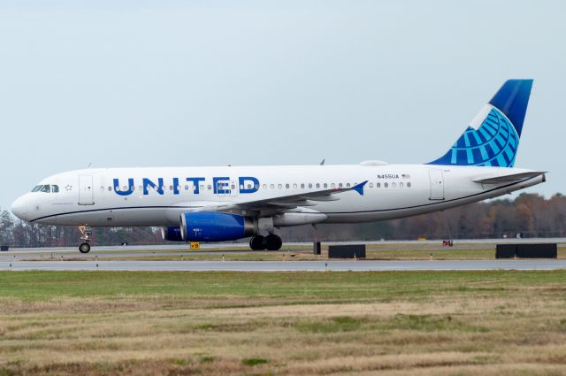 Airbus A320 (N455UA) - 455 turning off runway 23 12/03/2022